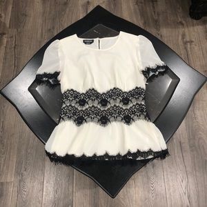 Bebe white and black gorgeous top.